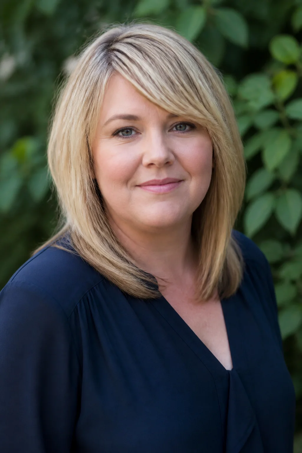 Soft shoulder-length layers for a round face